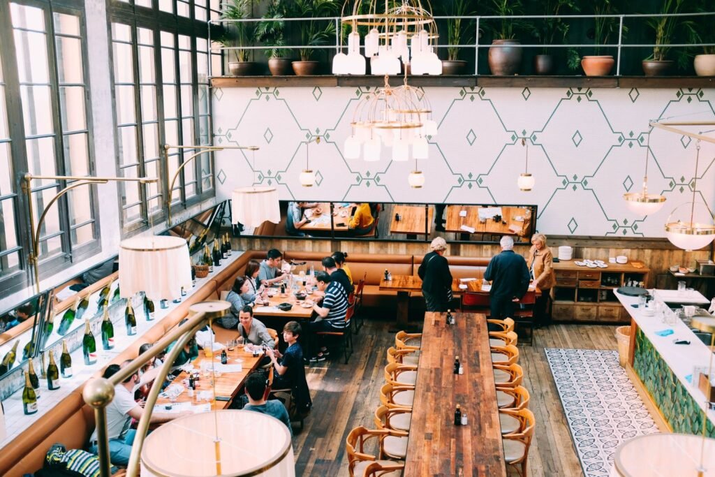 Restaurant interior with wooden tables after a commercial fit-out