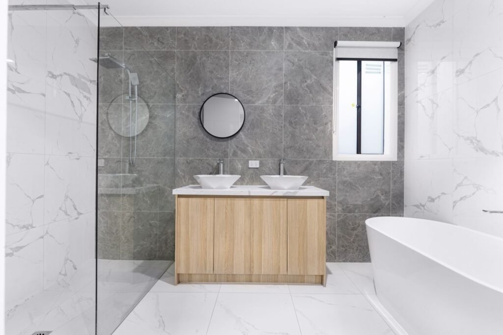 Modern renovated bathroom with double vanity