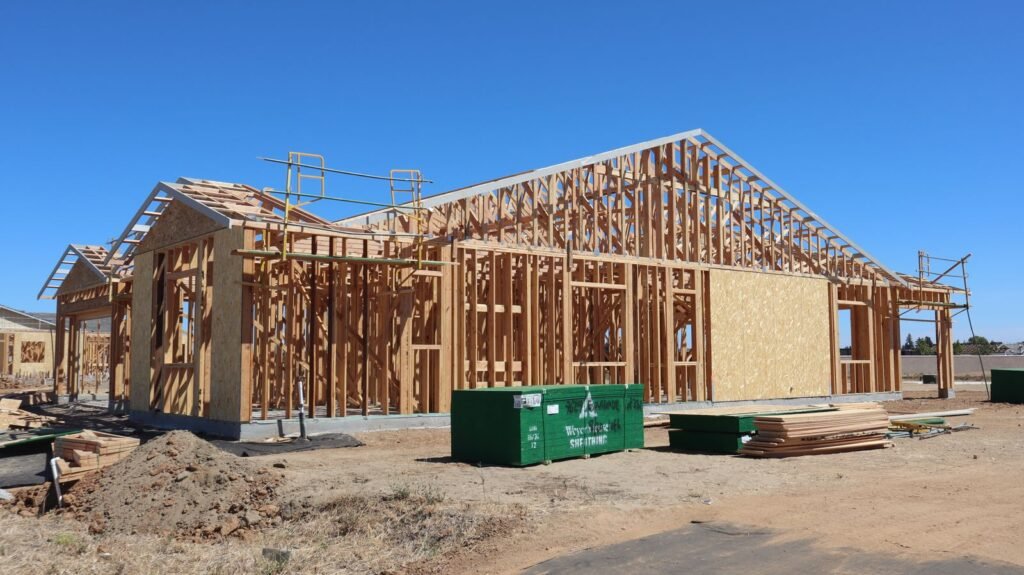 Wood-framed house under construction, the stage where Oakville building inspections take place